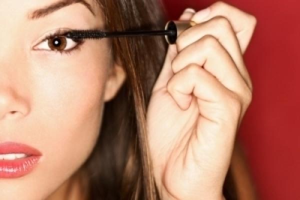 Girl putting on makeup